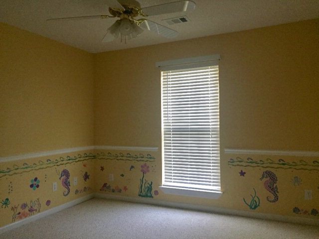 3416 Lower Hartley Bridge Road Byron, GA 31008 - Photo 12 of 28 a view of an empty room with a window