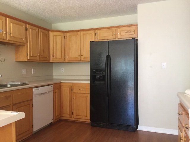 3416 Lower Hartley Bridge Road Byron, GA 31008 - Photo 6 of 28 a kitchen with stainless steel appliances granite countertop a refrigerator and a stove