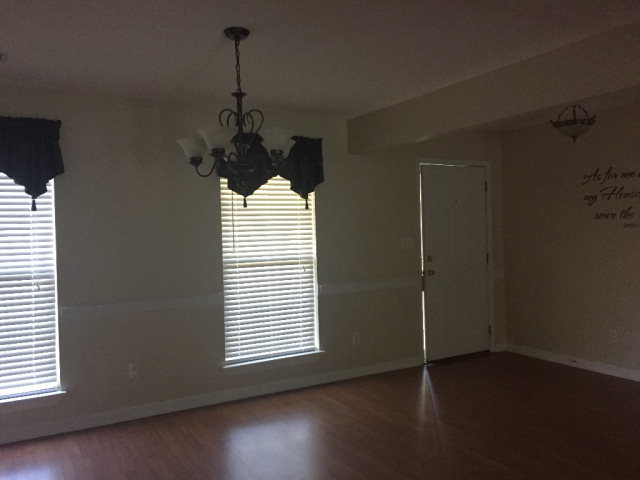 3416 Lower Hartley Bridge Road Byron, GA 31008 - Photo 9 of 28 an empty room with a window and wooden floor