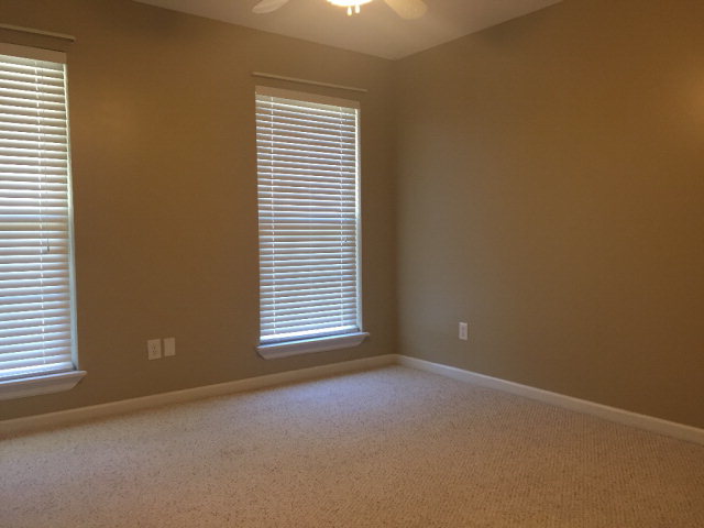 3416 Lower Hartley Bridge Road Byron, GA 31008 - Photo 10 of 28 an empty room with windows