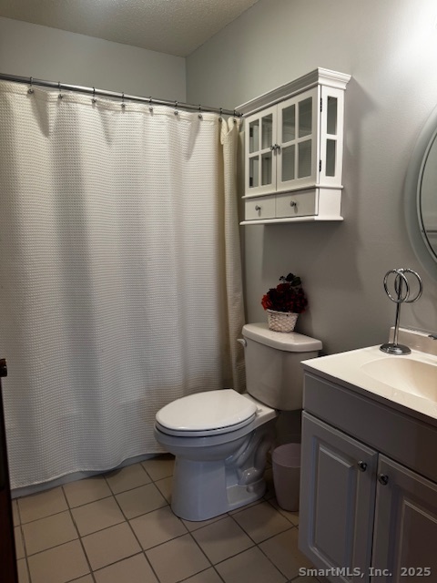 24 Millbrook Court Newington, CT 06111 - Photo 4 of 12 a bathroom with a sink and a toilet