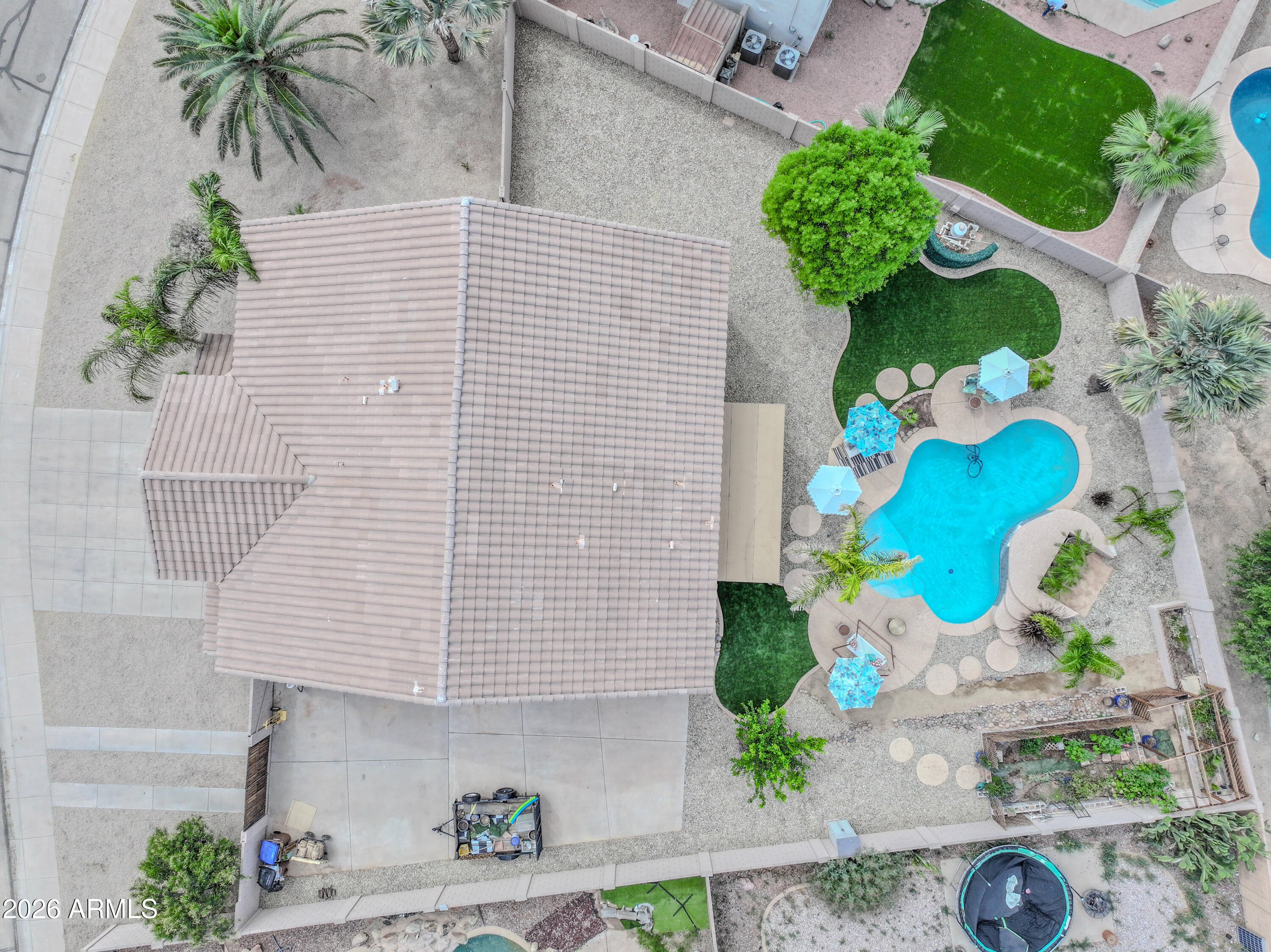 3378 East Silverbell Road San Tan Valley, AZ 85143 - Photo 2 of 61 an aerial view of a house and a yard