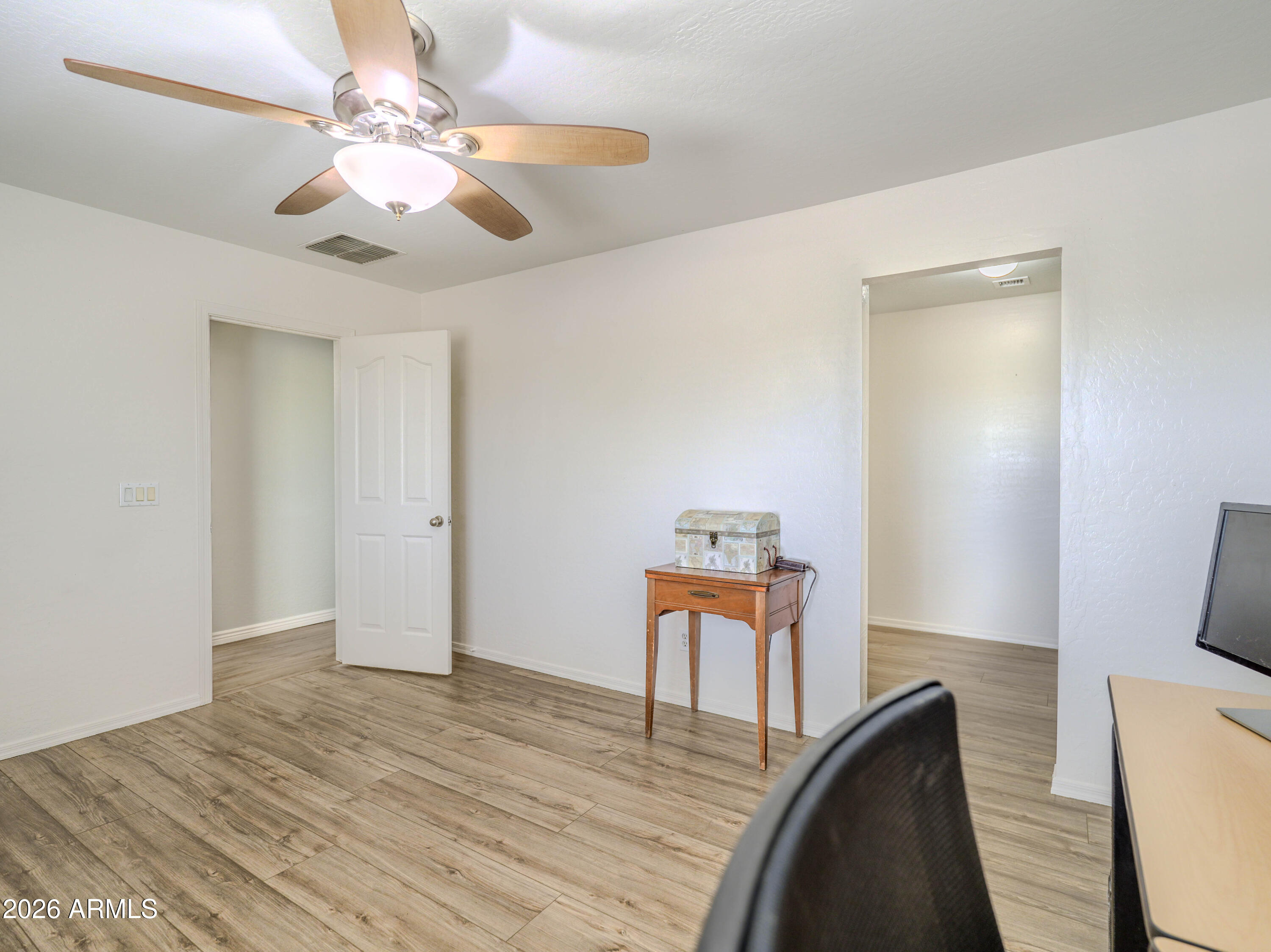 3378 East Silverbell Road San Tan Valley, AZ 85143 - Photo 41 of 61 a view of a livingroom with a fireplace