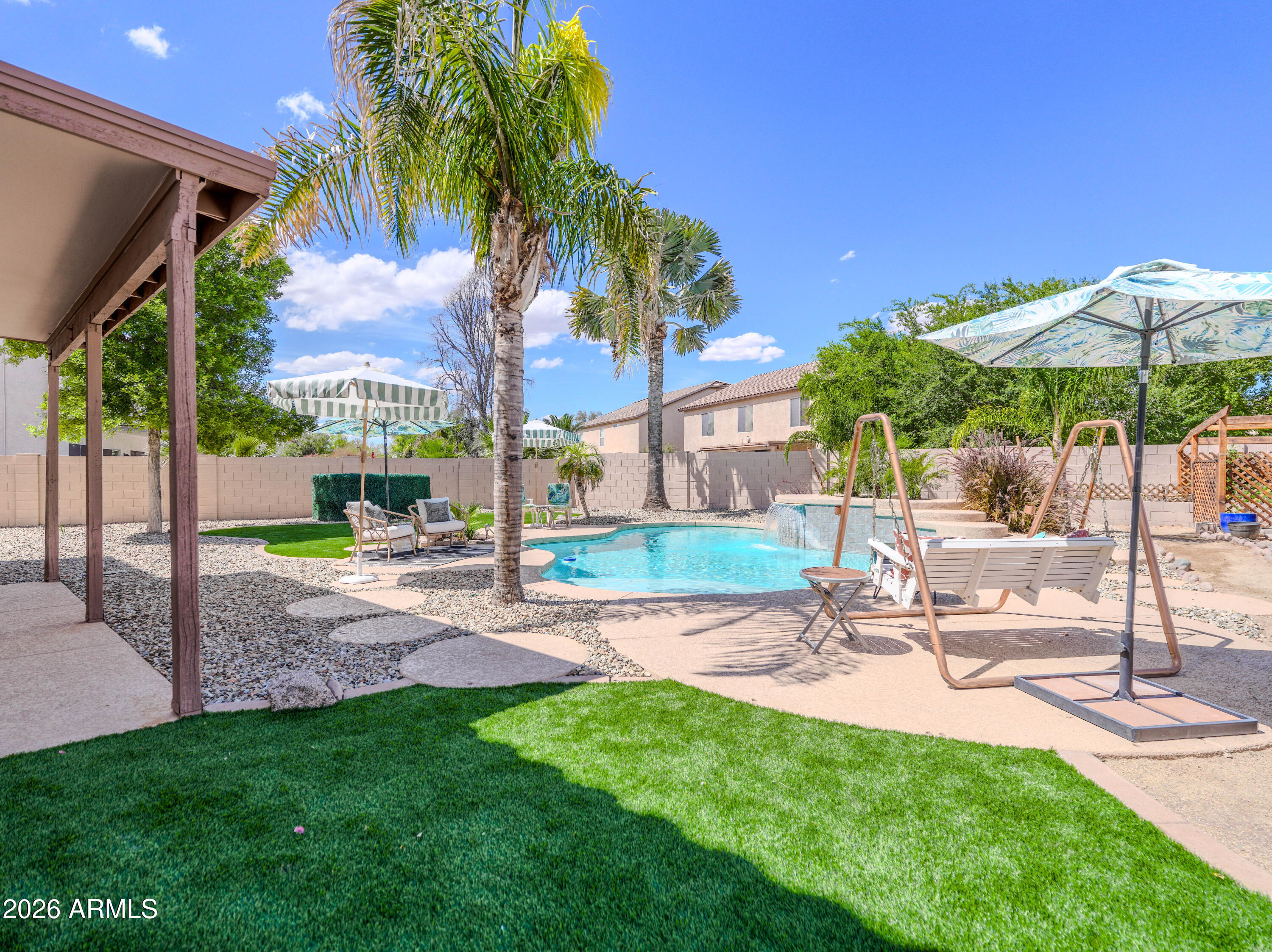 3378 East Silverbell Road San Tan Valley, AZ 85143 - Photo 48 of 61 a view of a backyard with a patio