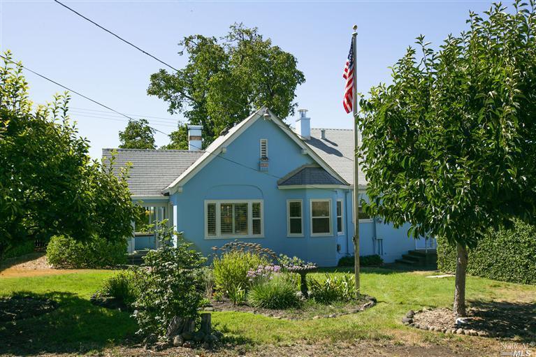 a house view with a garden space