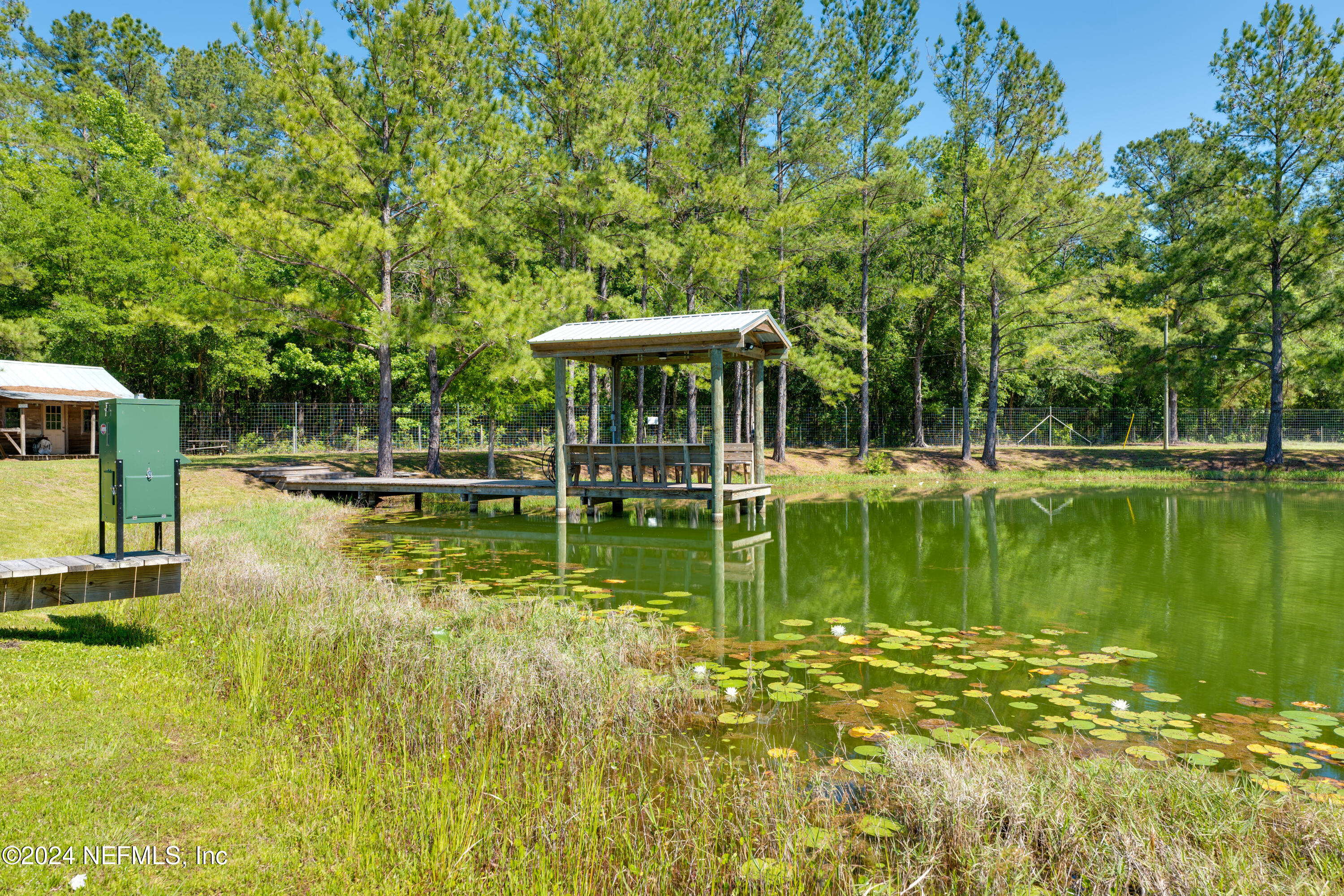 5800 Retreat Road Keystone Heights, FL 32656 - Photo 111 of 121 a view of a lake with house in front of it