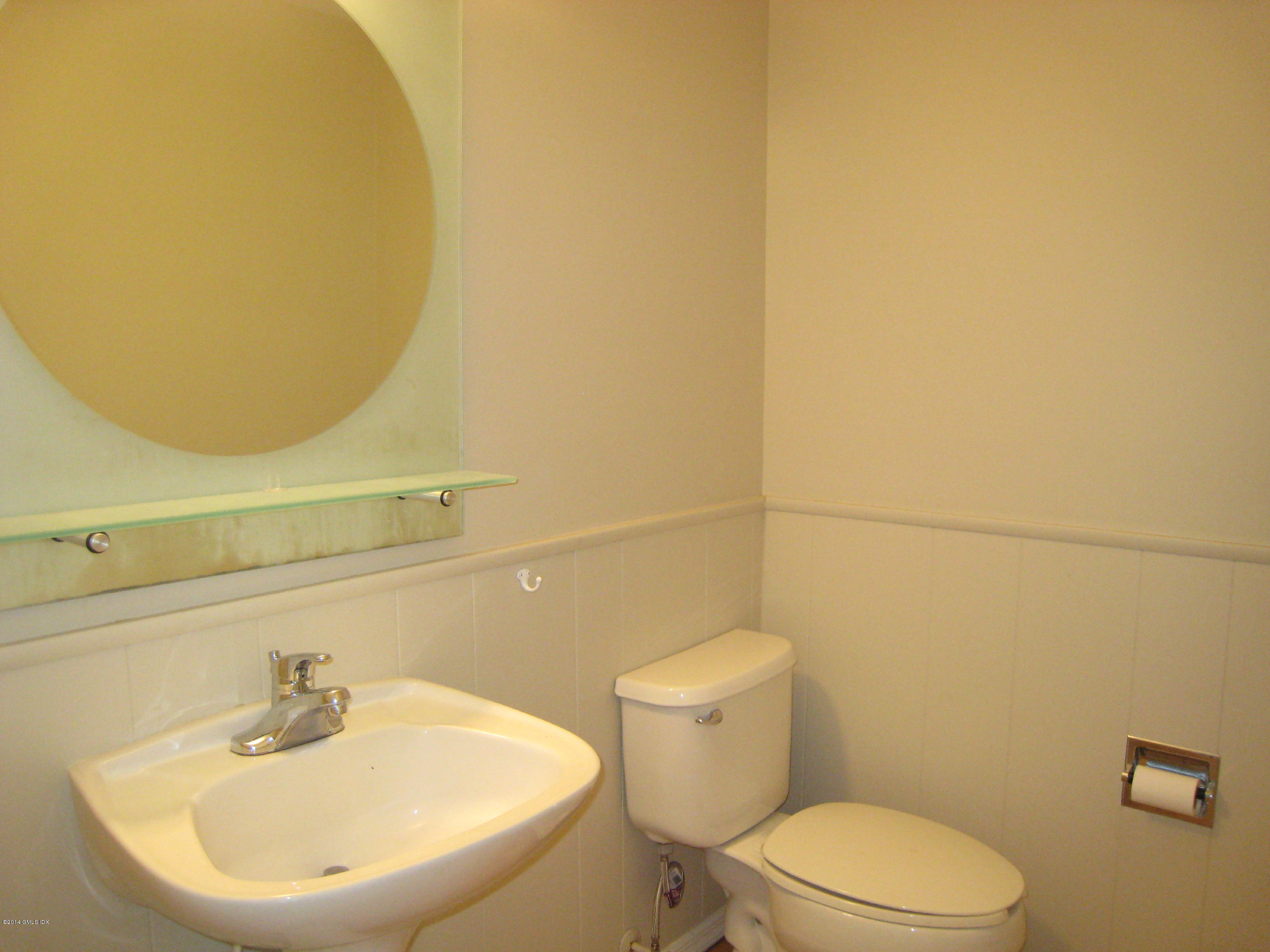 28 Rainbow Drive Riverside, CT 06878 - Photo 9 of 21 a bathroom with a sink mirror and toilet