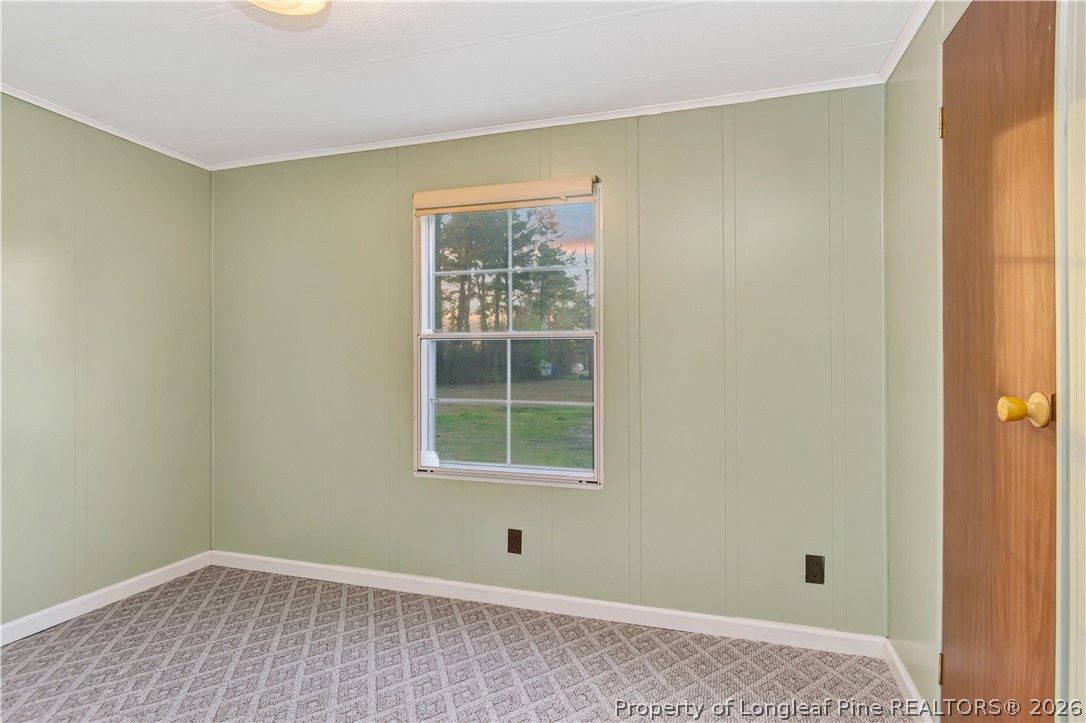 727 Rice Road Lumberton, NC 28358 - Photo 20 of 30 a view of an empty room with a window