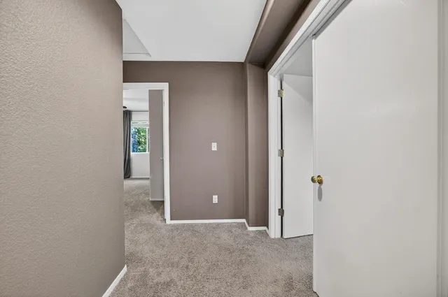a en suite bathroom with a sink and a mirror
