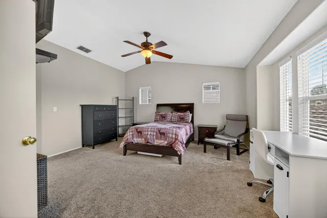 a view of house that has a window and the door