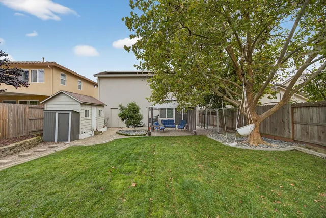 an aerial view of residential house with outdoor space and street view