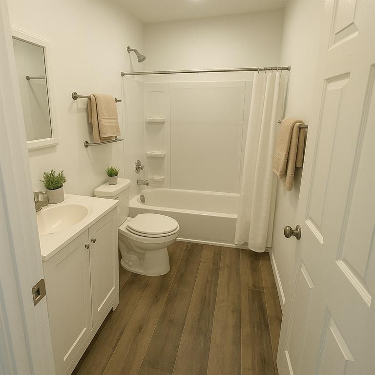 1154 Windsor Street Southwest Atlanta, GA 30310 - Photo 12 of 12 a bathroom with a sink a toilet and shower