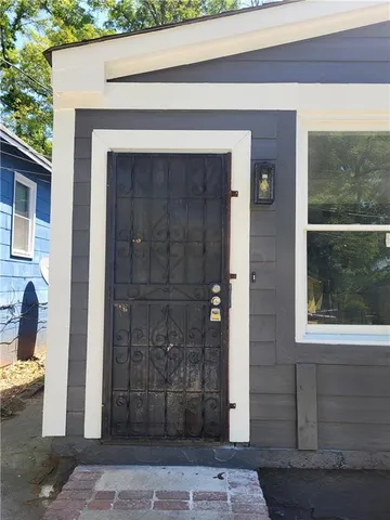 a front view of a house with a shower