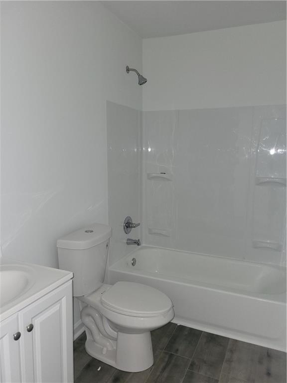 1154 Windsor Street Southwest Atlanta, GA 30310 - Photo 6 of 12 a bathroom with a toilet a sink and bathtub
