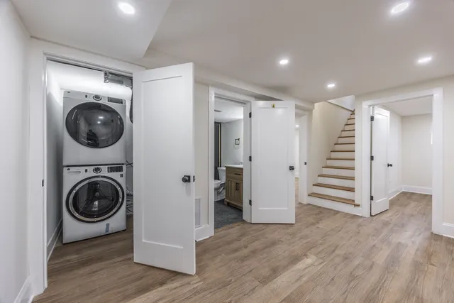 a view of room with wooden floor
