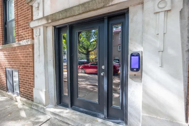 a kitchen with refrigerator cabinets and wooden floor