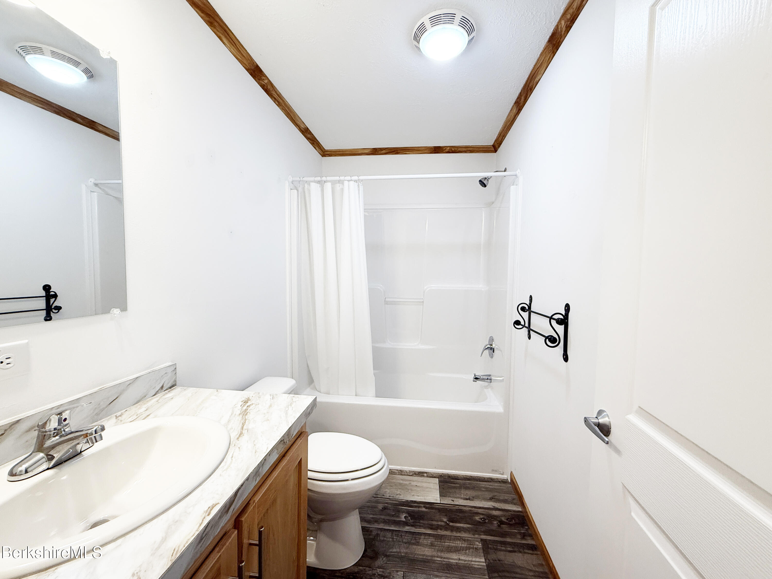 405 Pittsfield Road, Unit A6 Lenox, MA 01240 - Photo 11 of 17 a bathroom with a sink toilet and shower