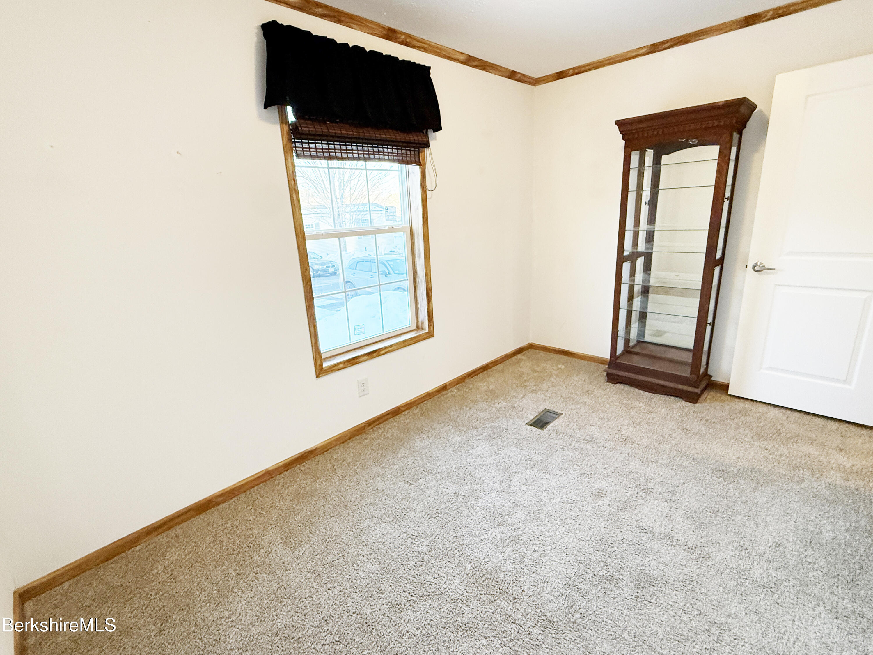 405 Pittsfield Road, Unit A6 Lenox, MA 01240 - Photo 13 of 17 an empty room with windows