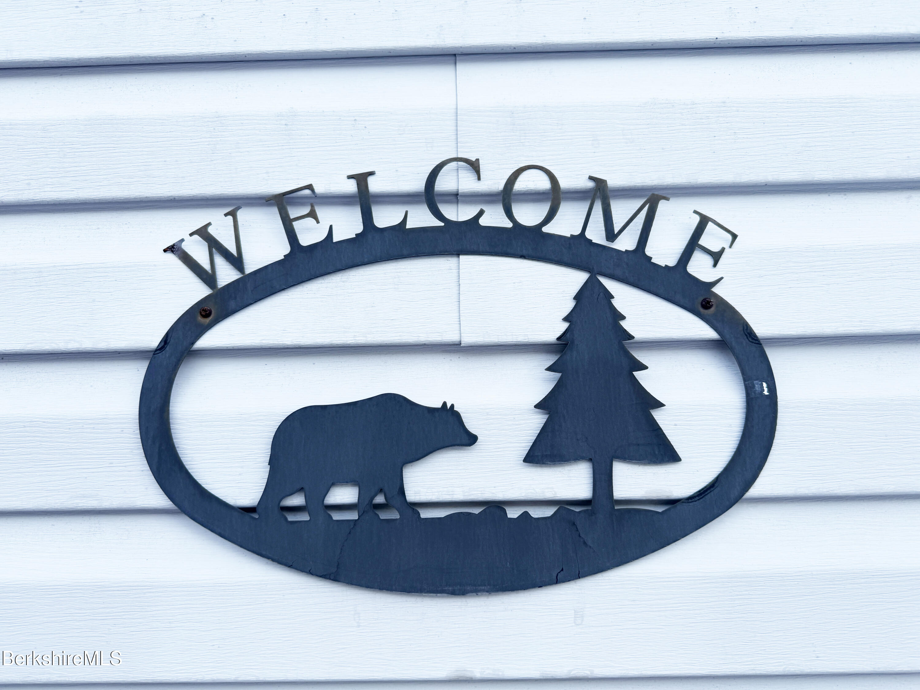 405 Pittsfield Road, Unit A6 Lenox, MA 01240 - Photo 4 of 17 a view of staircase with white walls and a potted plant