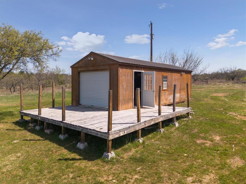Not Addressed Yet Not Addressed Yet Slusher Road Jacksboro, TX 76458 - Photo 5 of 22 a front view of a house with a yard view and swimming pool