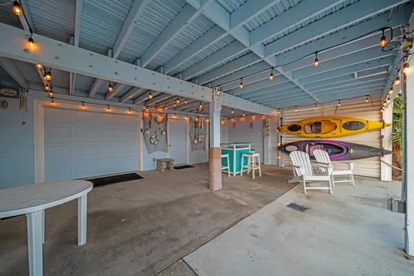 a view of a swimming pool with a chairs