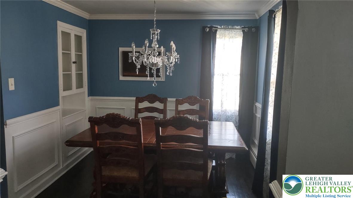 635 Silver Spring Boulevard Kunkletown, PA 18058 - Photo 15 of 34 a dining room with furniture and chandelier