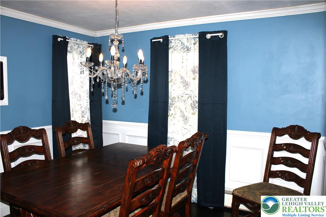 635 Silver Spring Boulevard Kunkletown, PA 18058 - Photo 16 of 34 a view of a dining room with furniture window and wooden floor