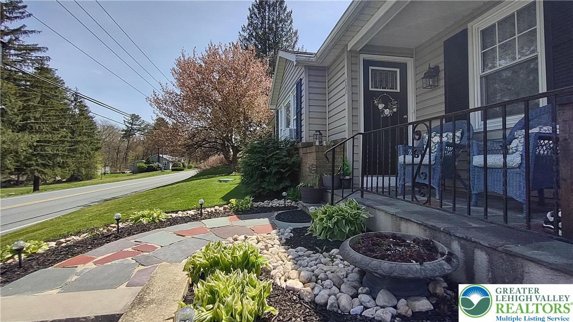 635 Silver Spring Boulevard Kunkletown, PA 18058 - Photo 2 of 34 a view of a garden with a fountain