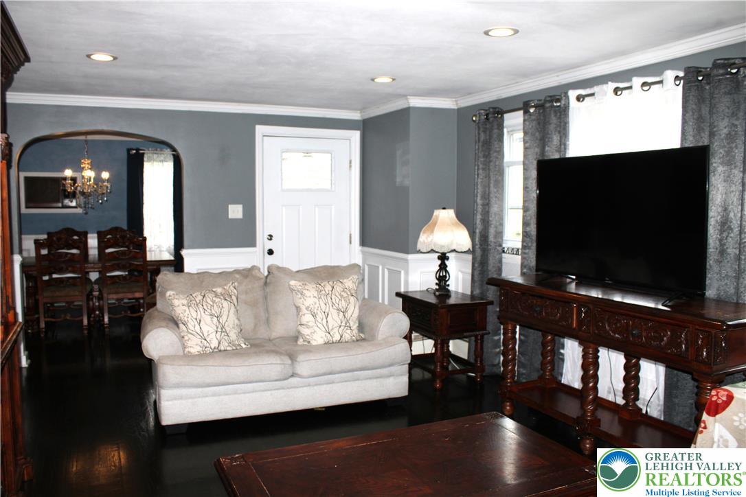 635 Silver Spring Boulevard Kunkletown, PA 18058 - Photo 21 of 34 a living room with furniture and a flat screen tv