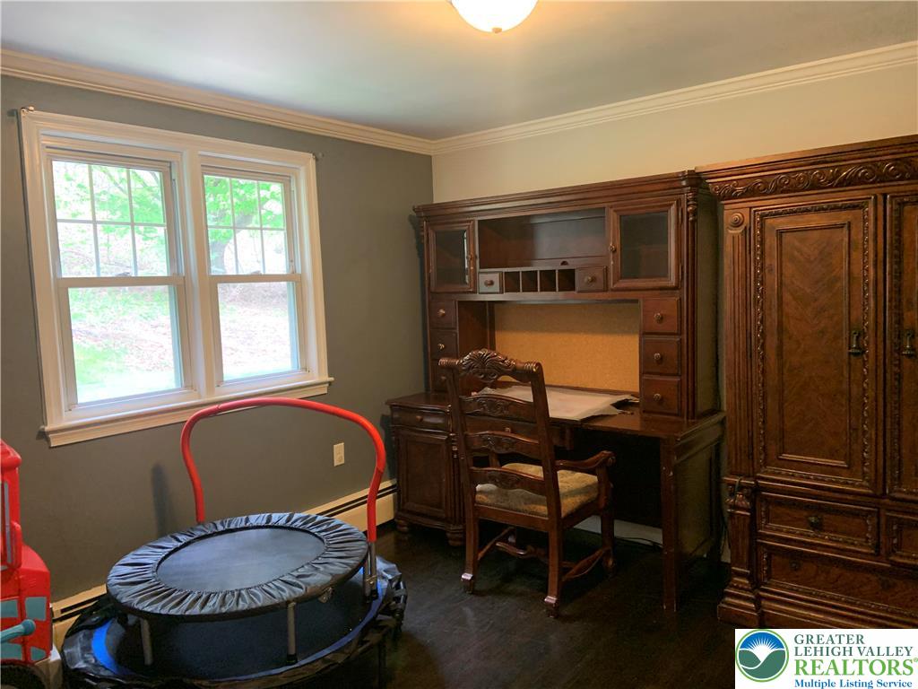 635 Silver Spring Boulevard Kunkletown, PA 18058 - Photo 26 of 34 a living room with furniture a window and a potted plant