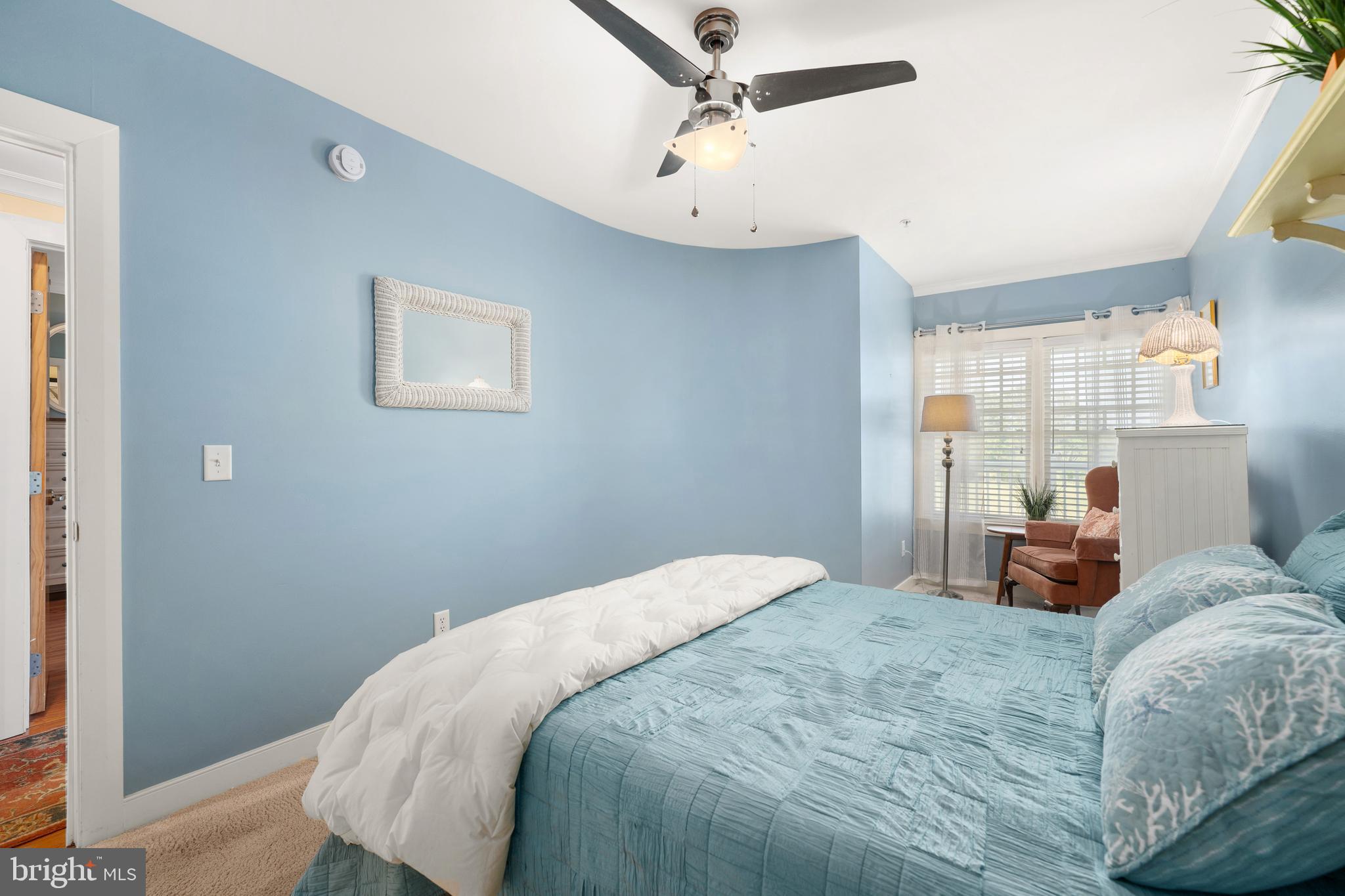 110 Anglers Road, Unit 206 Lewes, DE 19958 - Photo 24 of 40 a bedroom with a bed and a window