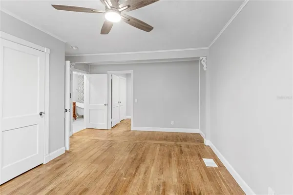 a view of a livingroom with wooden floor