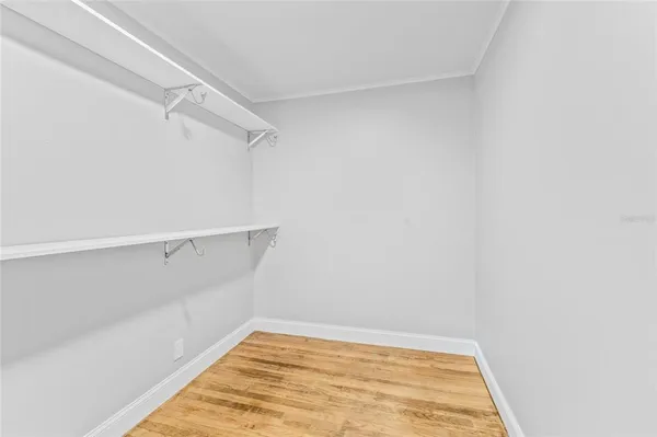 a view of a room with racks on the wall