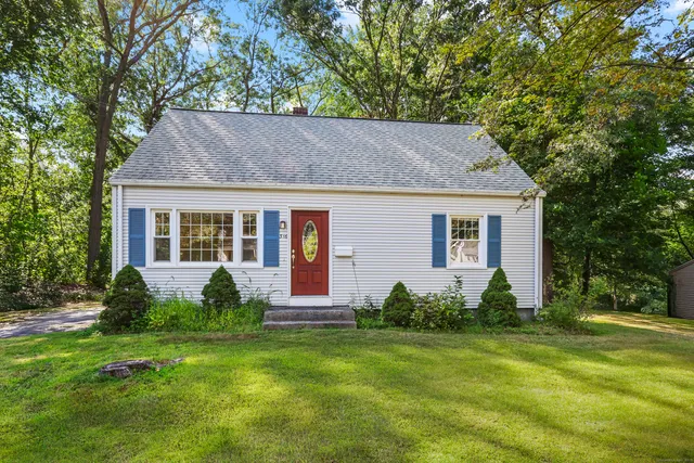a house view with a garden space