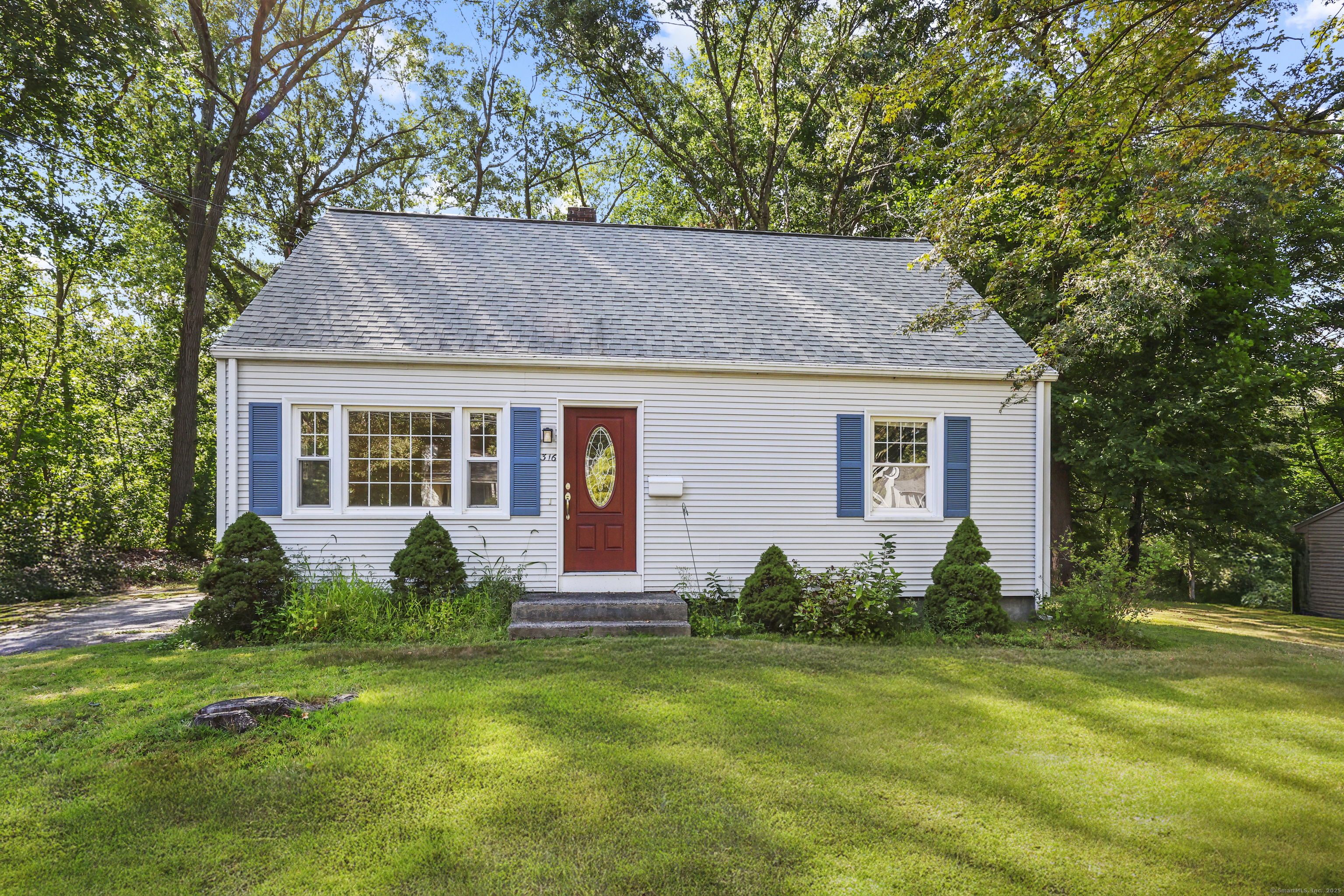 a house view with a garden space