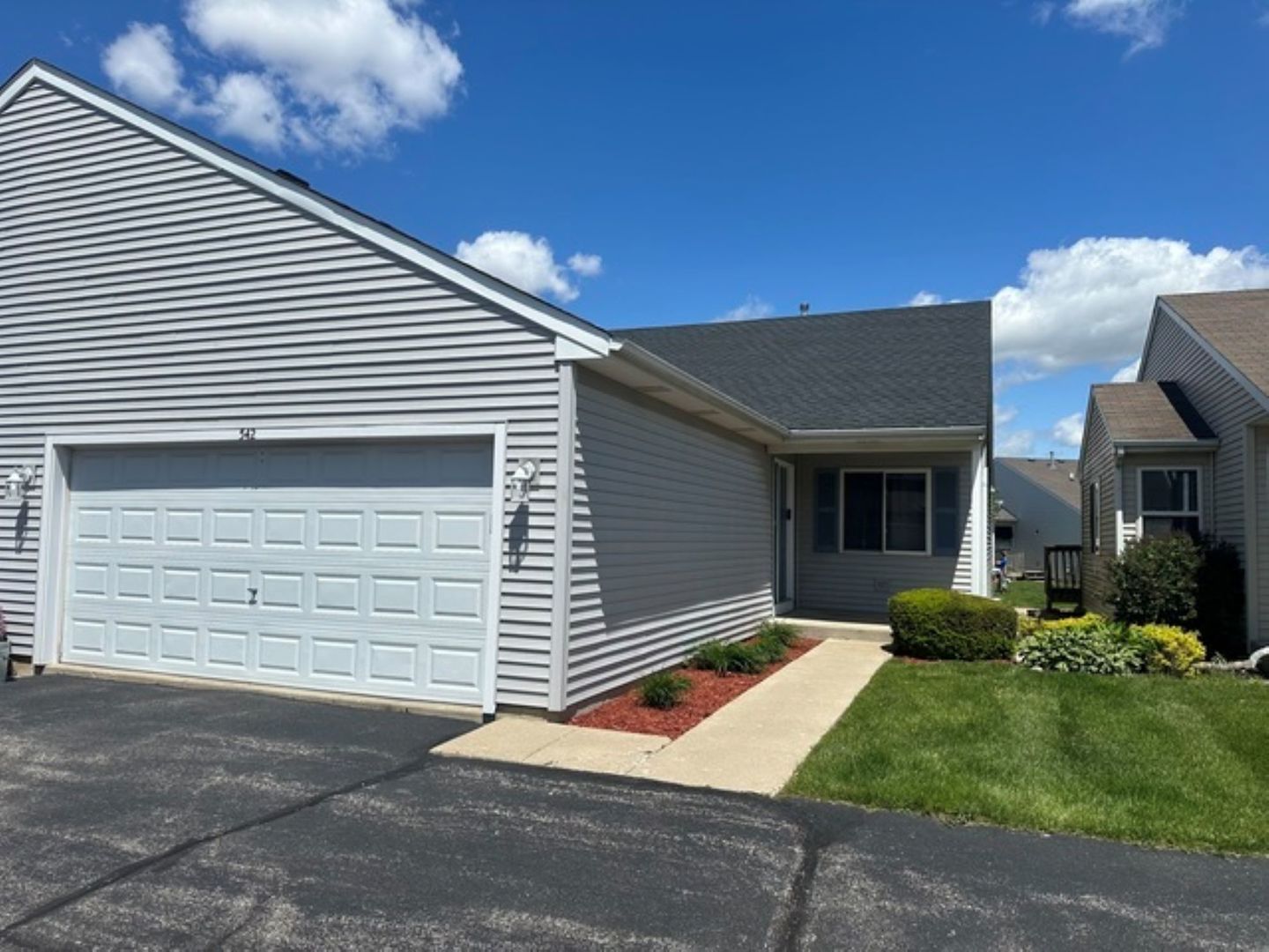 542 Timber Drive Harvard, IL 60033 - Photo 9 of 9 a backyard of a house with yard and outdoor seating