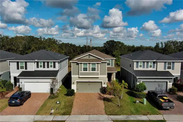 front view of a house with a yard
