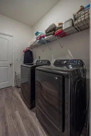 a utility room with dryer and washer