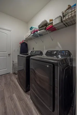 a utility room with dryer and washer