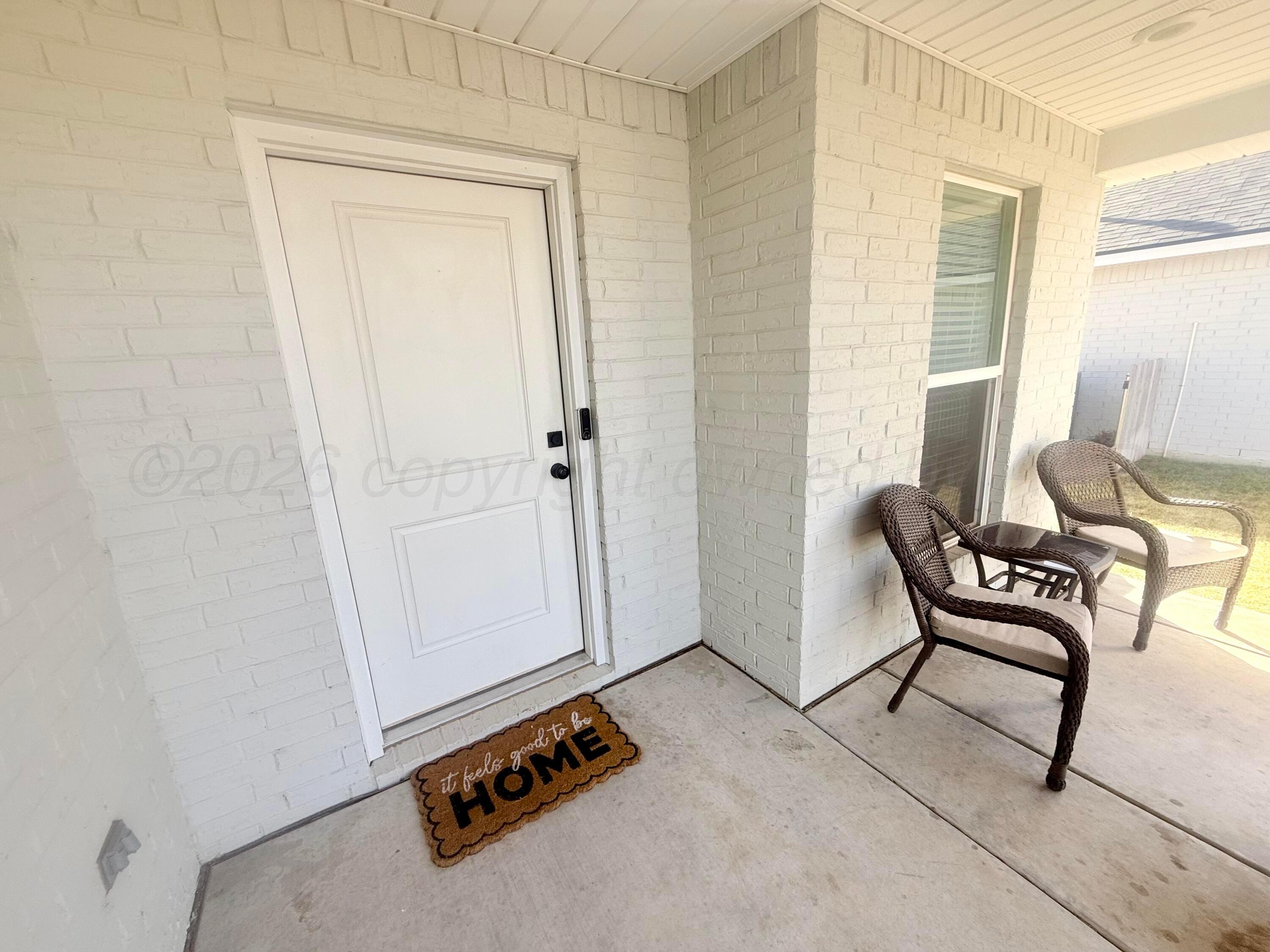 1529 Lullwater Road Amarillo, TX 79118 - Photo 4 of 29 a view of a room with furniture and windows