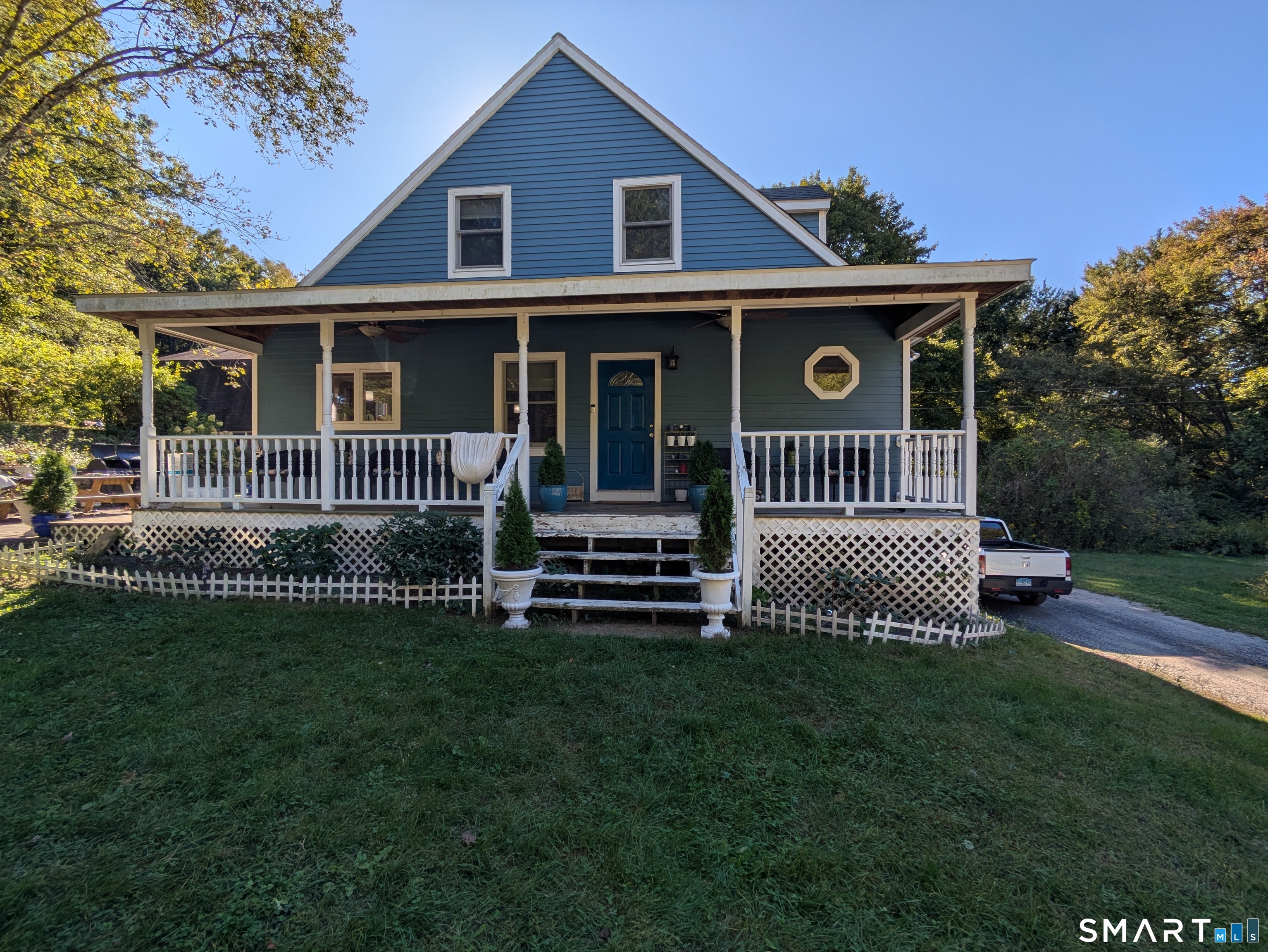 541 Benson Road Middlebury, CT 06762 - Photo 1 of 20 a front view of a house with a garden