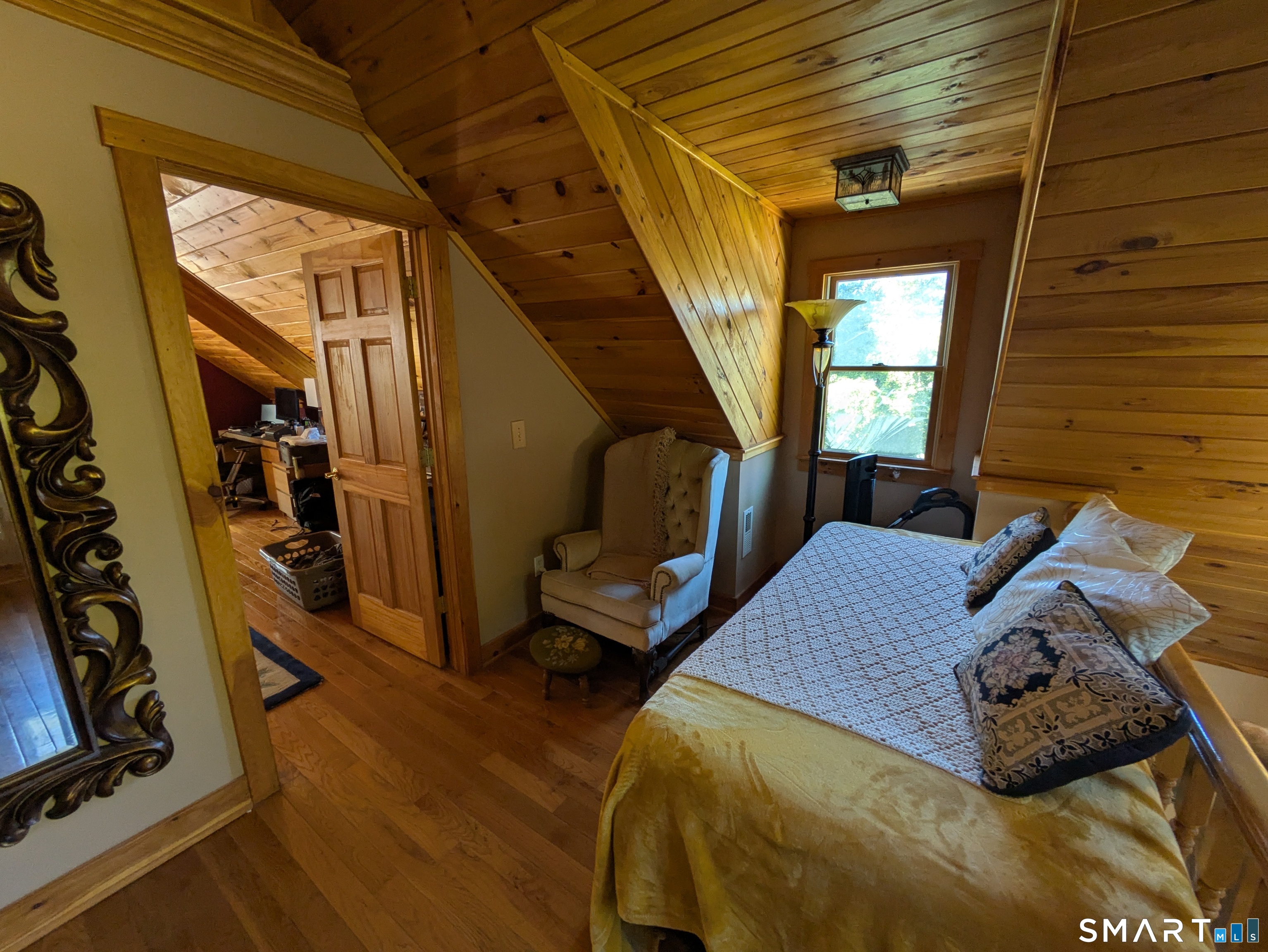 541 Benson Road Middlebury, CT 06762 - Photo 15 of 20 a bedroom with bed and a window