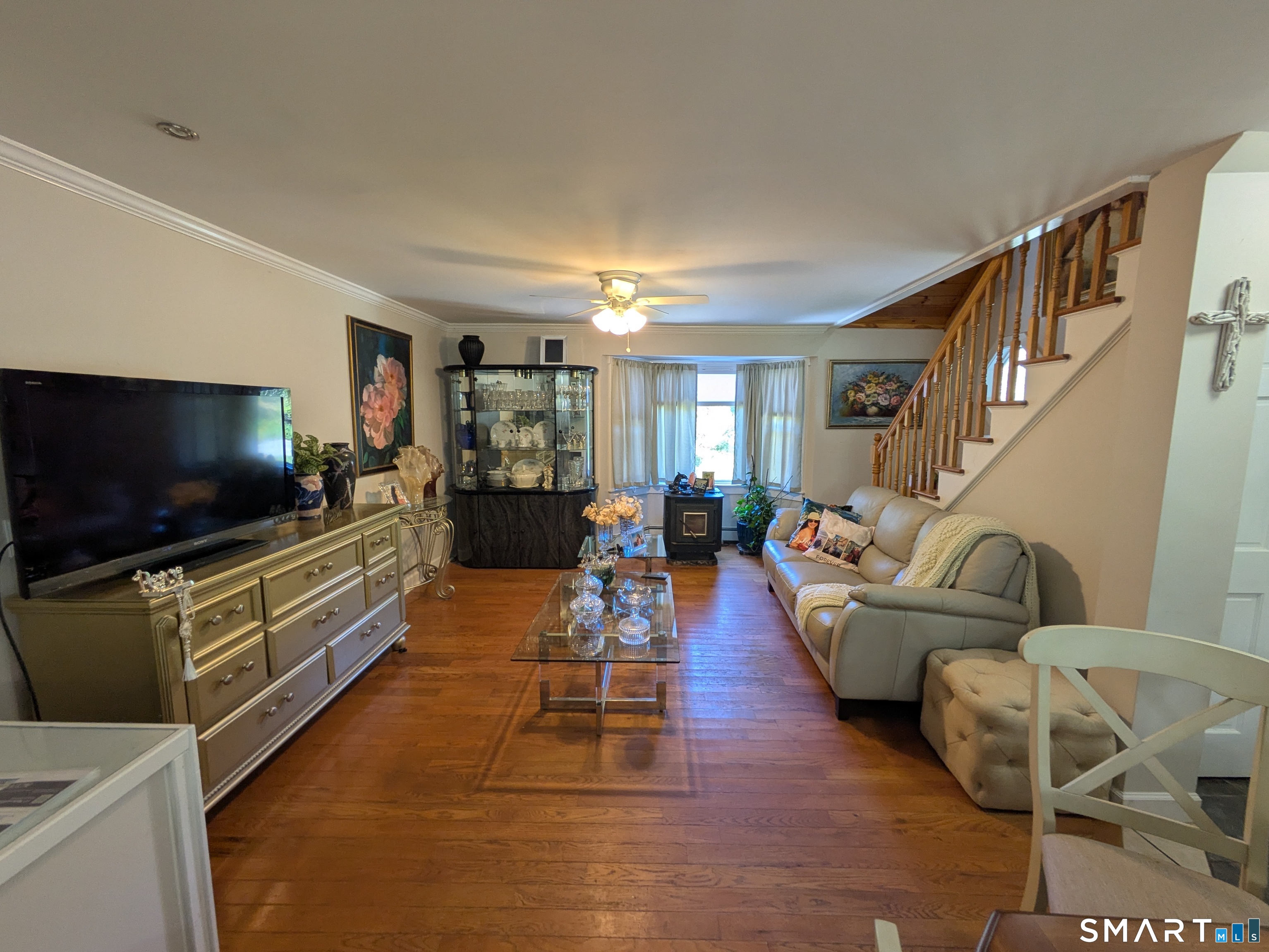 541 Benson Road Middlebury, CT 06762 - Photo 17 of 20 a living room with furniture and a flat screen tv