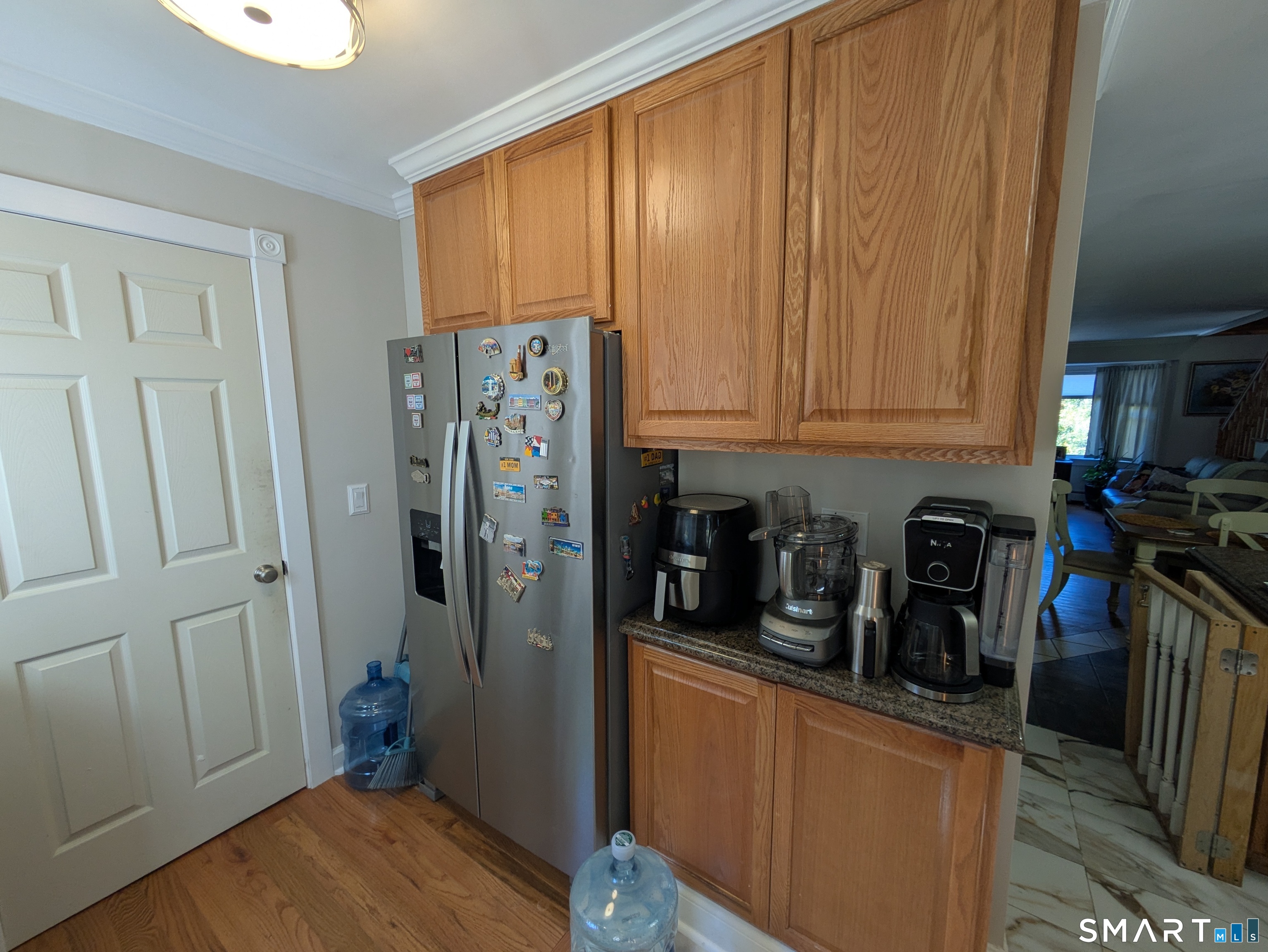 541 Benson Road Middlebury, CT 06762 - Photo 20 of 20 a kitchen with stainless steel appliances granite countertop a refrigerator and a sink
