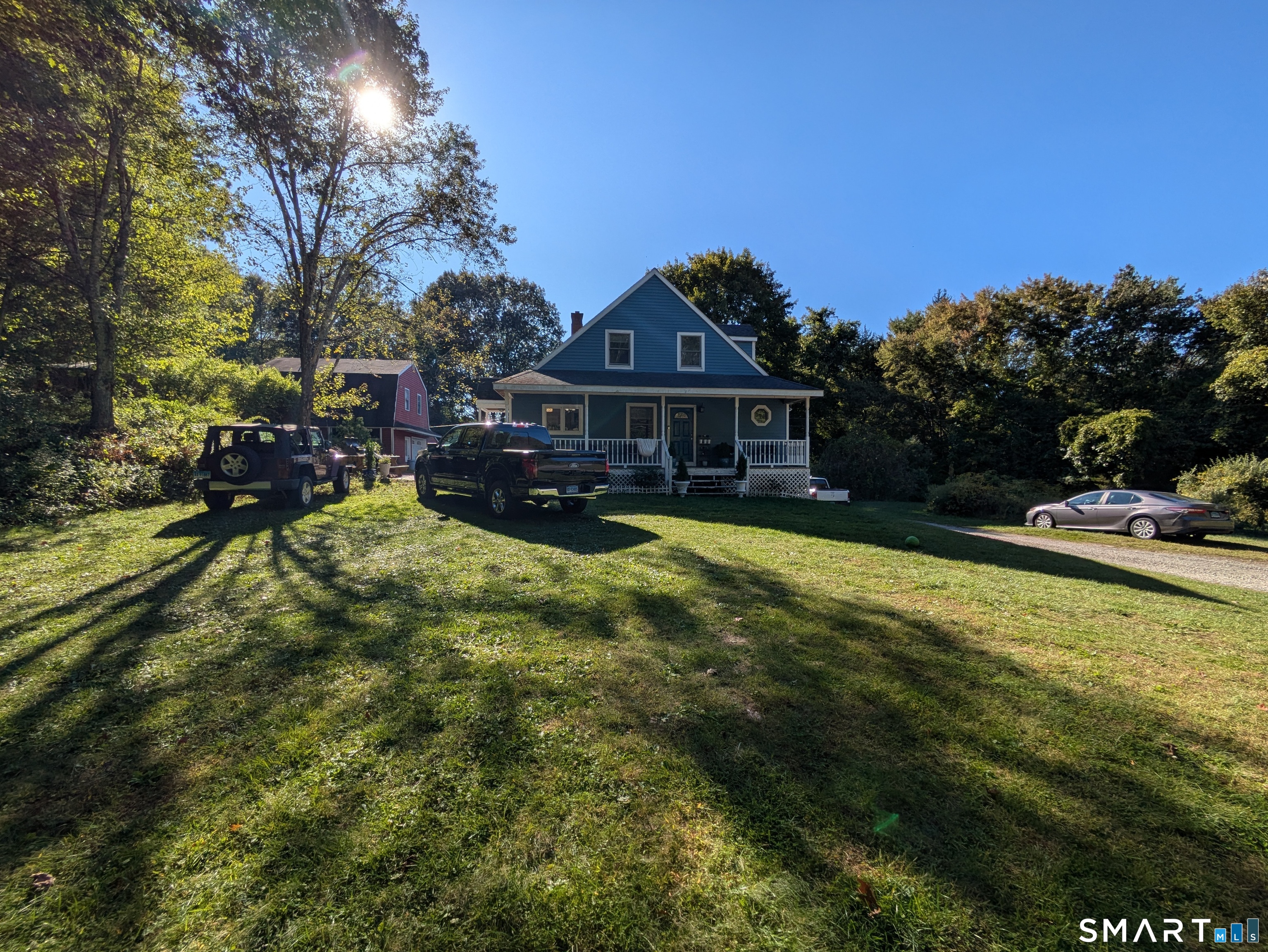 541 Benson Road Middlebury, CT 06762 - Photo 3 of 20 a view of a house with a yard