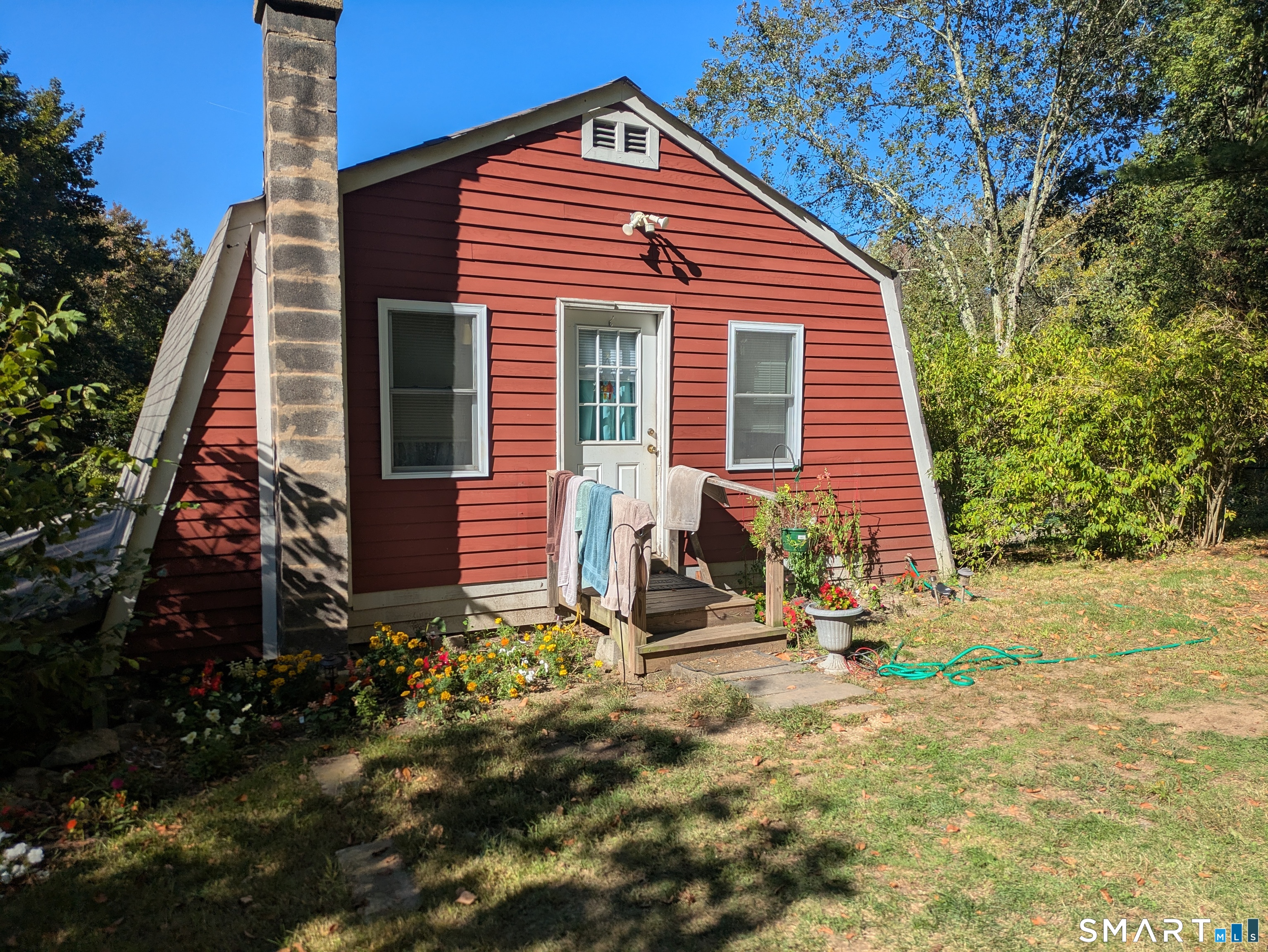 541 Benson Road Middlebury, CT 06762 - Photo 4 of 20 a view of a house with backyard