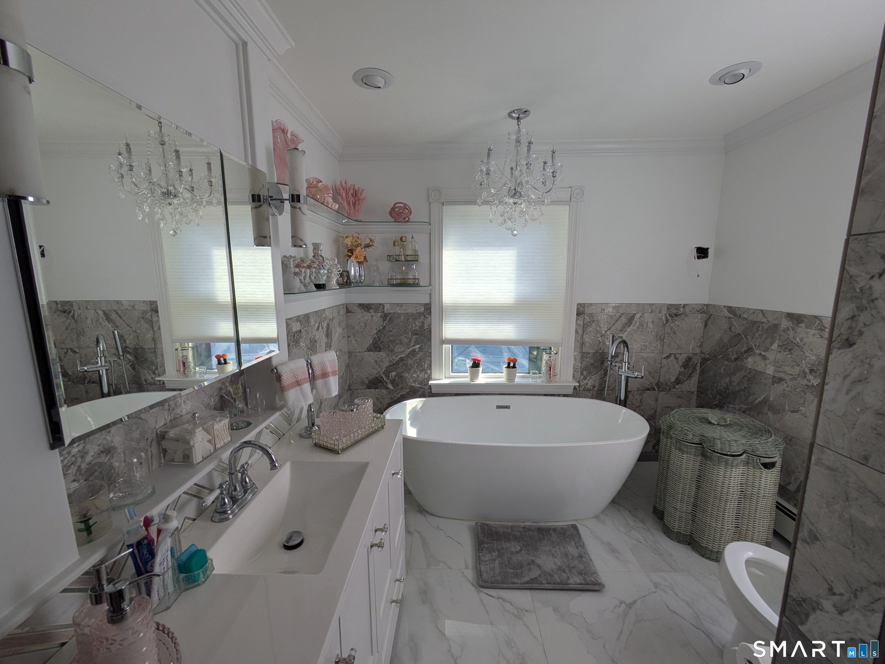 541 Benson Road Middlebury, CT 06762 - Photo 9 of 20 a bathroom with a sink toilet and shower