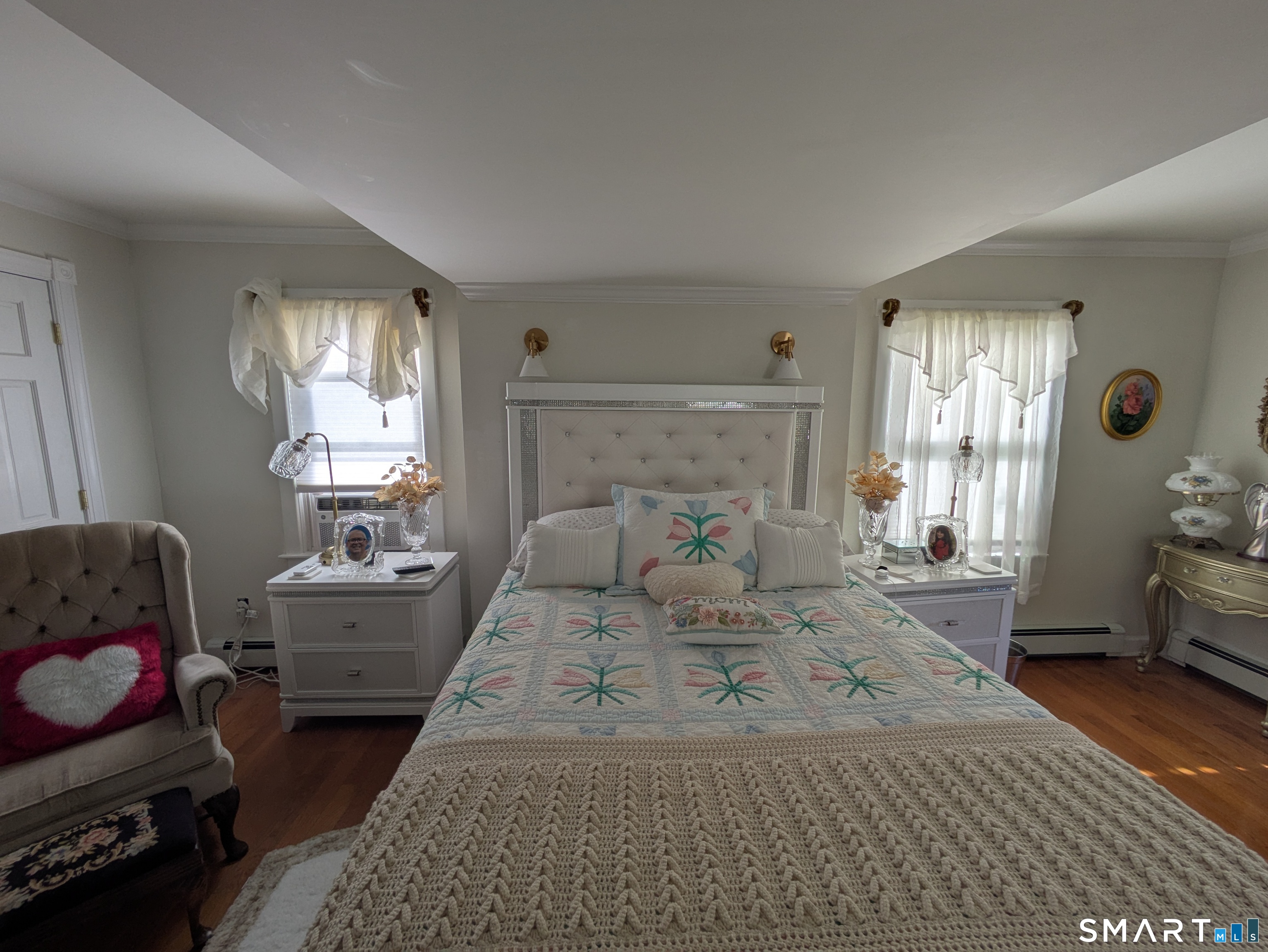 541 Benson Road Middlebury, CT 06762 - Photo 10 of 20 a bed room with furniture and a window