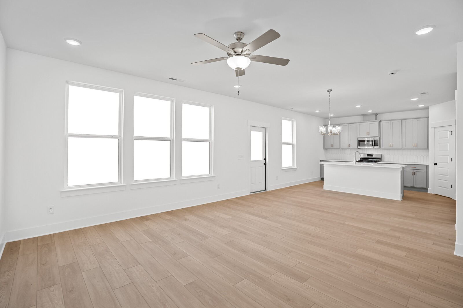 2155 Barnwood Road Gallatin, TN 37066 - Photo 14 of 51 a view of an empty room with a kitchen and a window