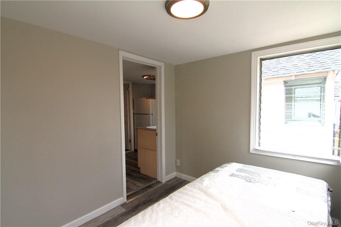 71 Miller Road, Unit 6 Hopewell Junction, NY 12533 - Photo 15 of 22 a bedroom with a bed and a window